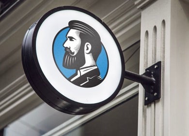 Round sign at Adam's Republic | Al-Shati, الدمام, المنطقة الشرقية, SA with vintage barber illustration.