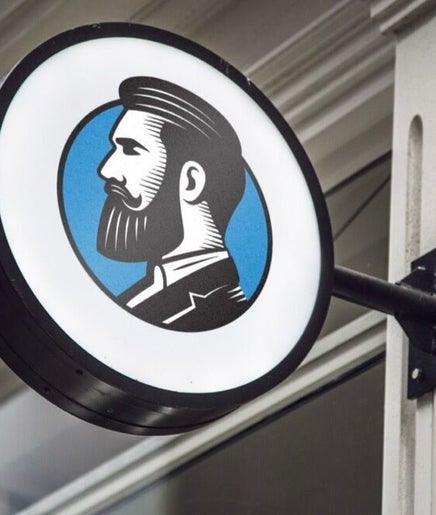 Round sign at Adam's Republic | Al-Shati, الدمام, المنطقة الشرقية, SA with vintage barber illustration.