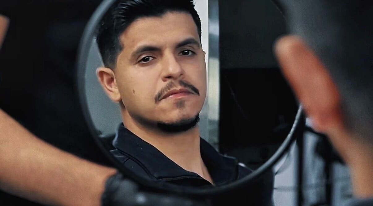 Reflection of a man in a mirror at Adam's Republic | Al-Shati, Dammam, المنطقة الشرقية, SA.