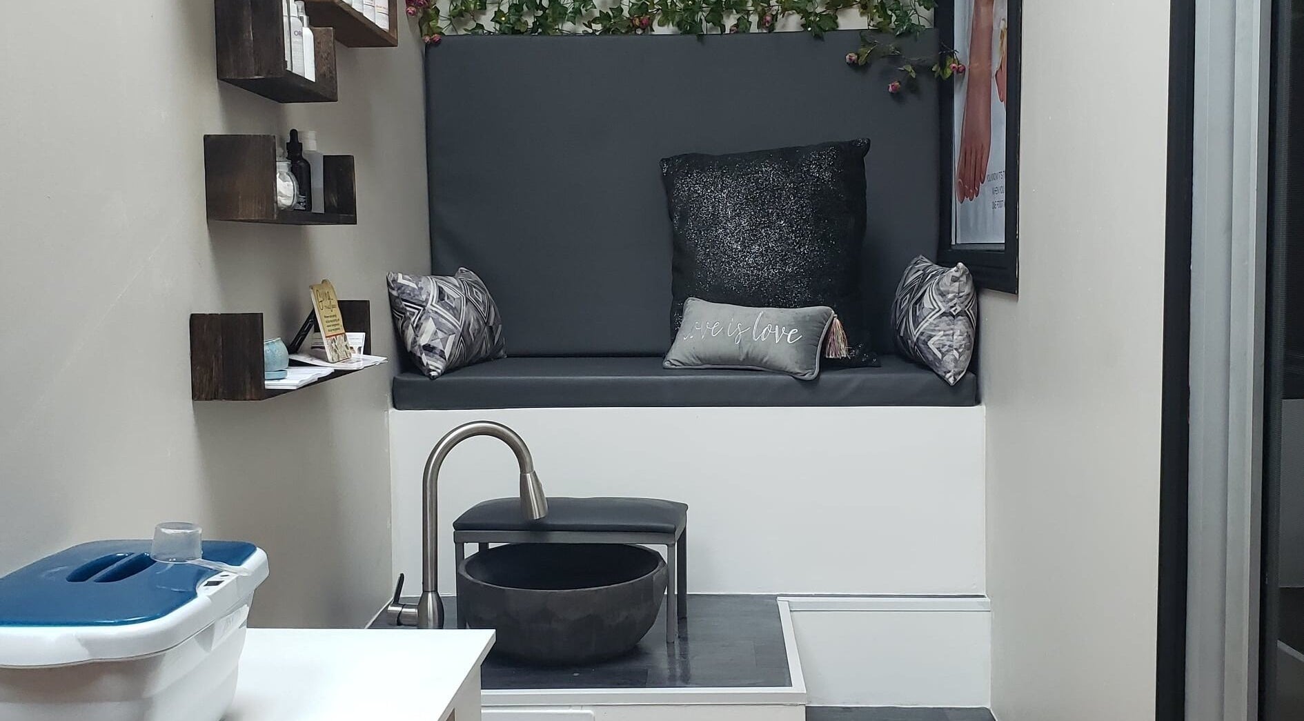 Elegant spa seating at InnoSense Salon and Med Spa, St. James, TT, featuring plush cushions and modern décor.