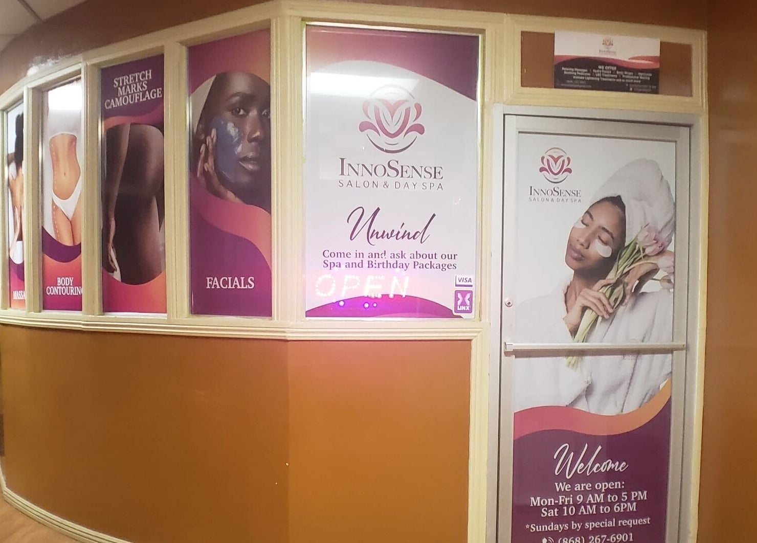 Welcoming entrance of InnoSense Salon and Med Spa, St. James, TT, highlighting massage and spa services.