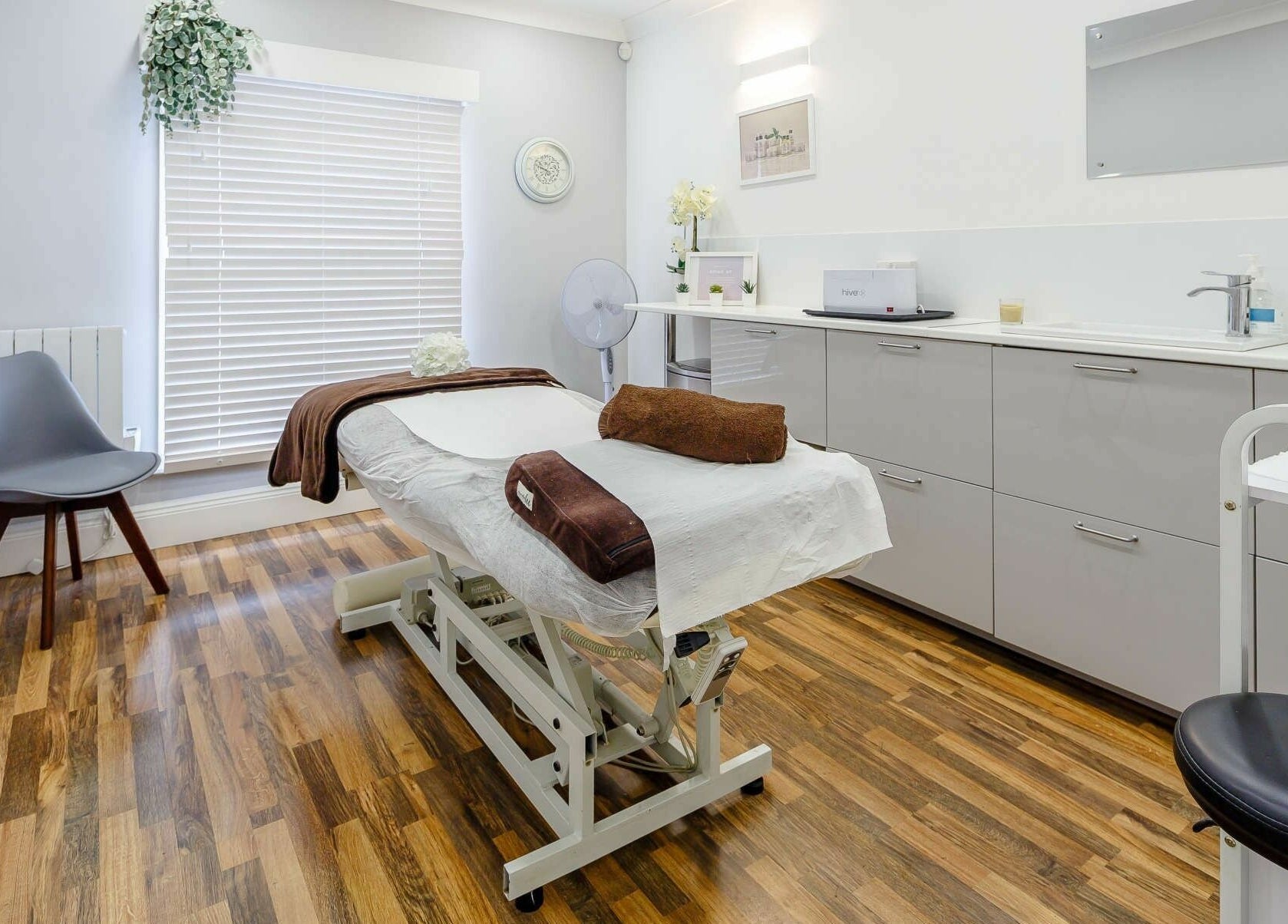 Tranquil massage room at Harmony Day Spa Royston, Royston, England, GB, featuring a cozy treatment bed.