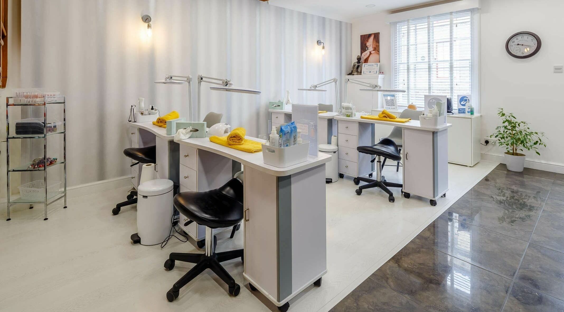 Bright nail care area at Harmony Day Spa Royston, Royston, England, GB with stylish decor and comfortable seating.