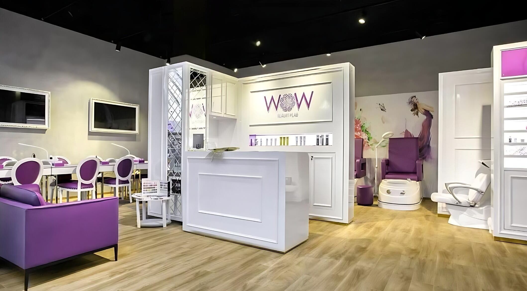 Interior of Wow Beauty Lab MYMALL, a chic salon in Limassol, Limassol, CY with elegant purple and white decor.