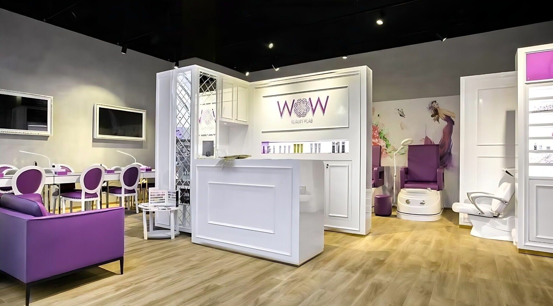 Interior of Wow Beauty Lab MYMALL, a chic salon in Limassol, Limassol, CY with elegant purple and white decor.