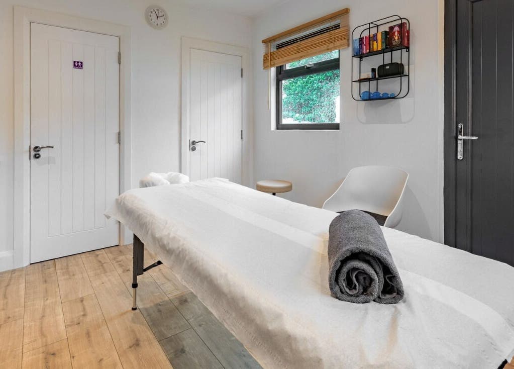 Relaxing Therapies massage room in Dublin 8, County Dublin, IE with cozy treatment bed and calming decor.