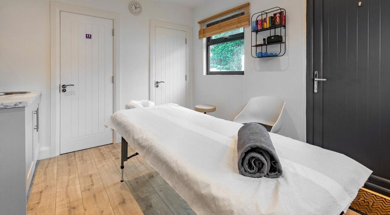 Relaxing Therapies massage room in Dublin 8, County Dublin, IE with cozy treatment bed and calming decor.