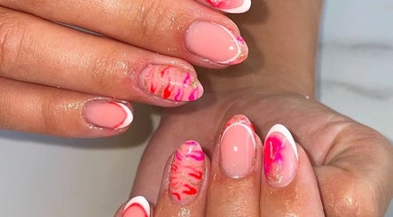 Stylish pink nail art at Blossom Beauty, Dublin, County Dublin, IE, showcasing intricate designs.
