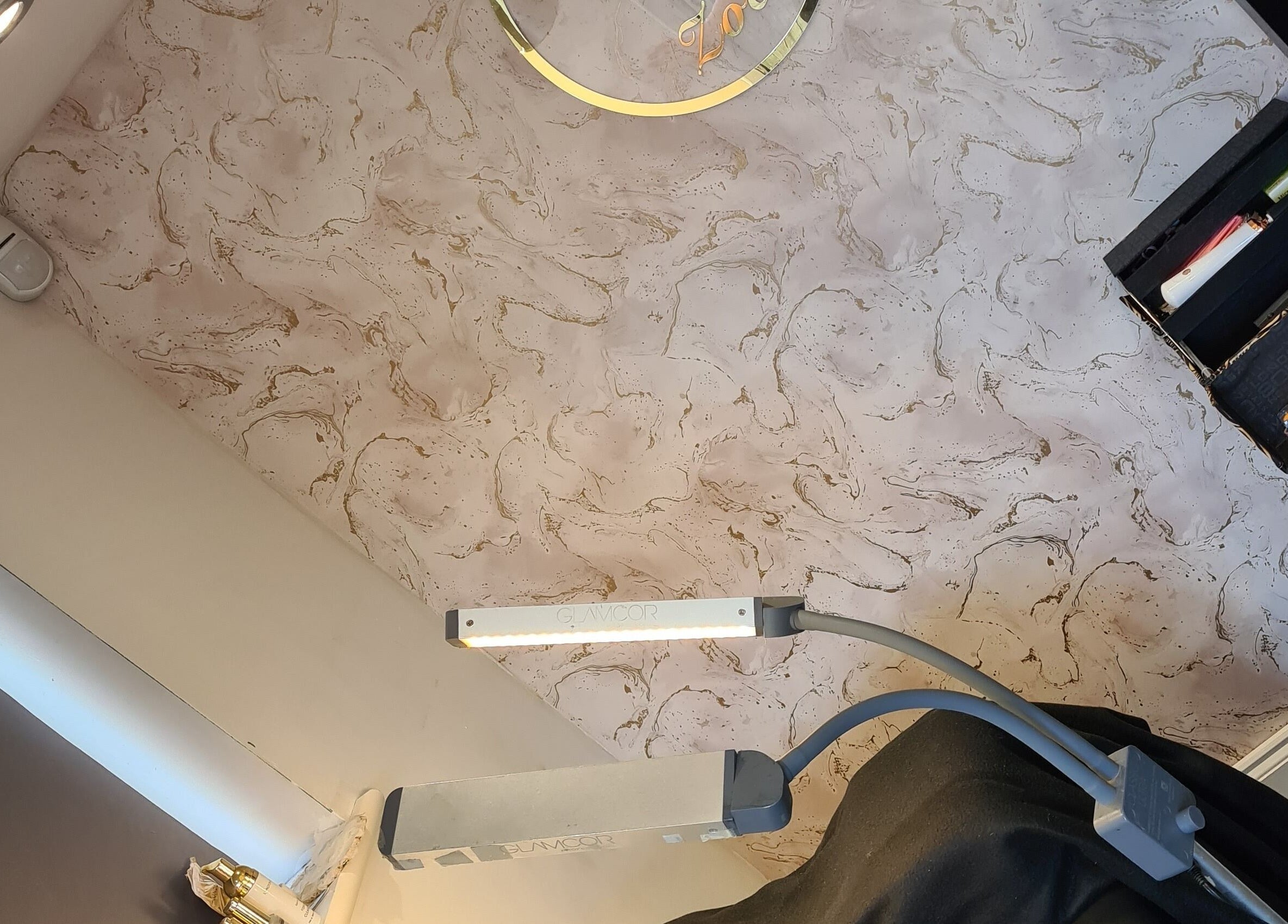 Stylish interior of Lashes and Beauty by Zoe Home Studio Winstanley, Wigan, England, GB with chic wall decor.