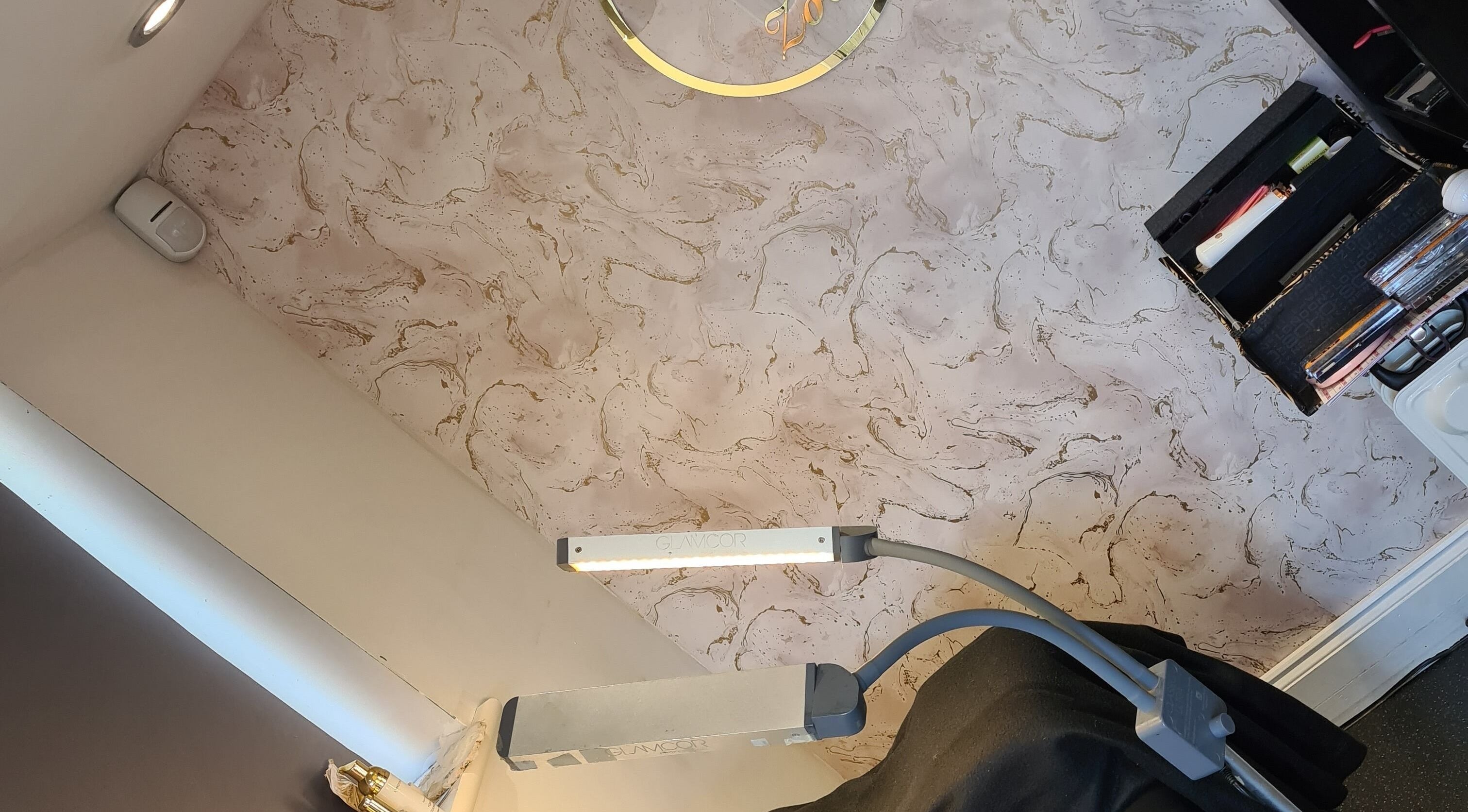 Stylish interior of Lashes and Beauty by Zoe Home Studio Winstanley, Wigan, England, GB with chic wall decor.