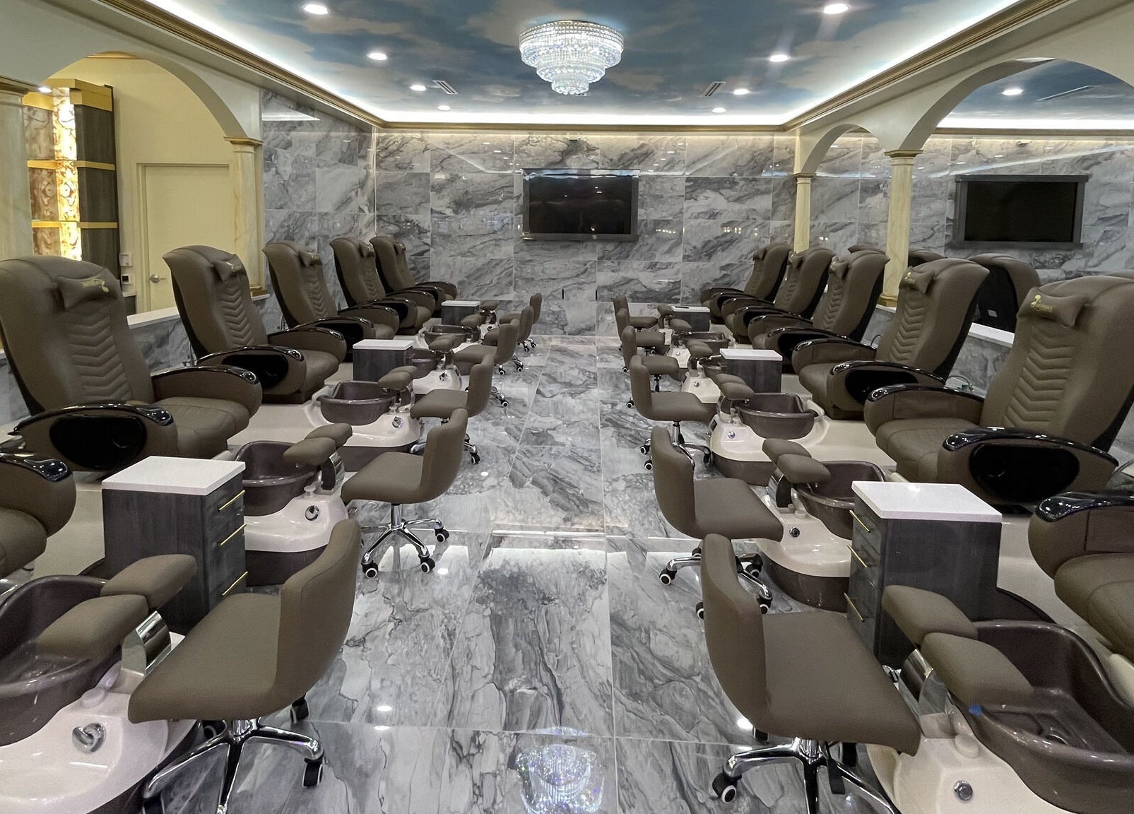 Luxurious pedicure chairs at Luminous V Nail Spa in Springboro, Ohio, US, highlighting modern elegance.
