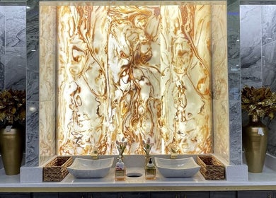 Luxurious marble decor with warm lighting at Luminous V Nail Spa, Springboro, Ohio, US.