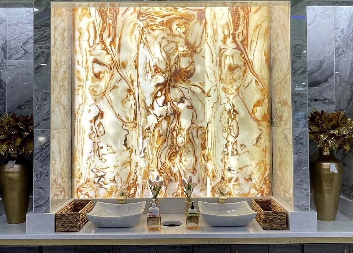 Luxurious marble decor with warm lighting at Luminous V Nail Spa, Springboro, Ohio, US.