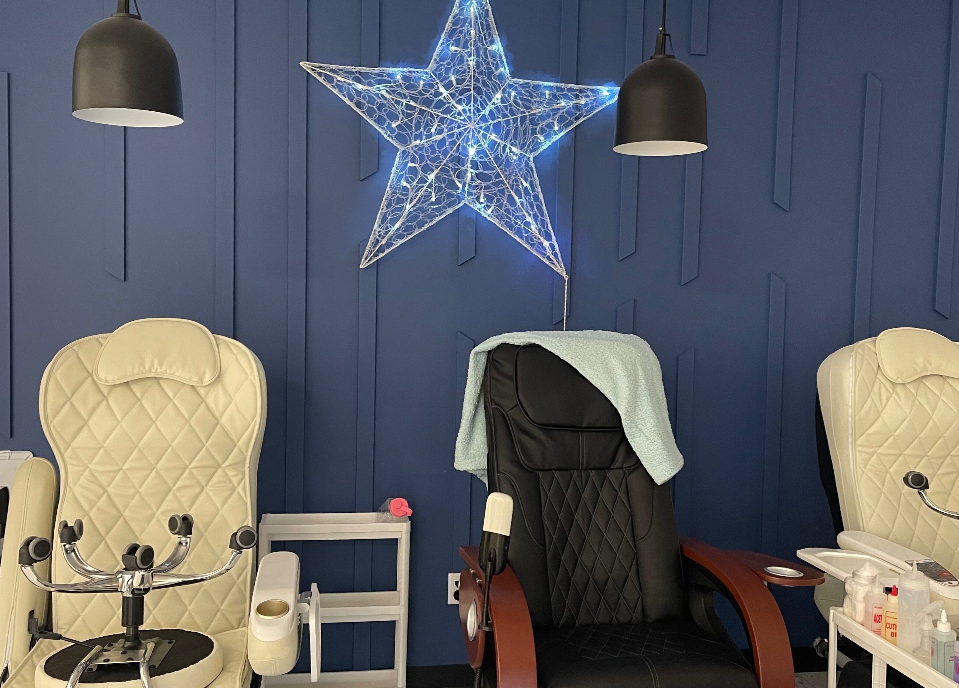 Elegant pedicure chairs with a star decoration at Monserrat Nails, Kenosha, Wisconsin, US.