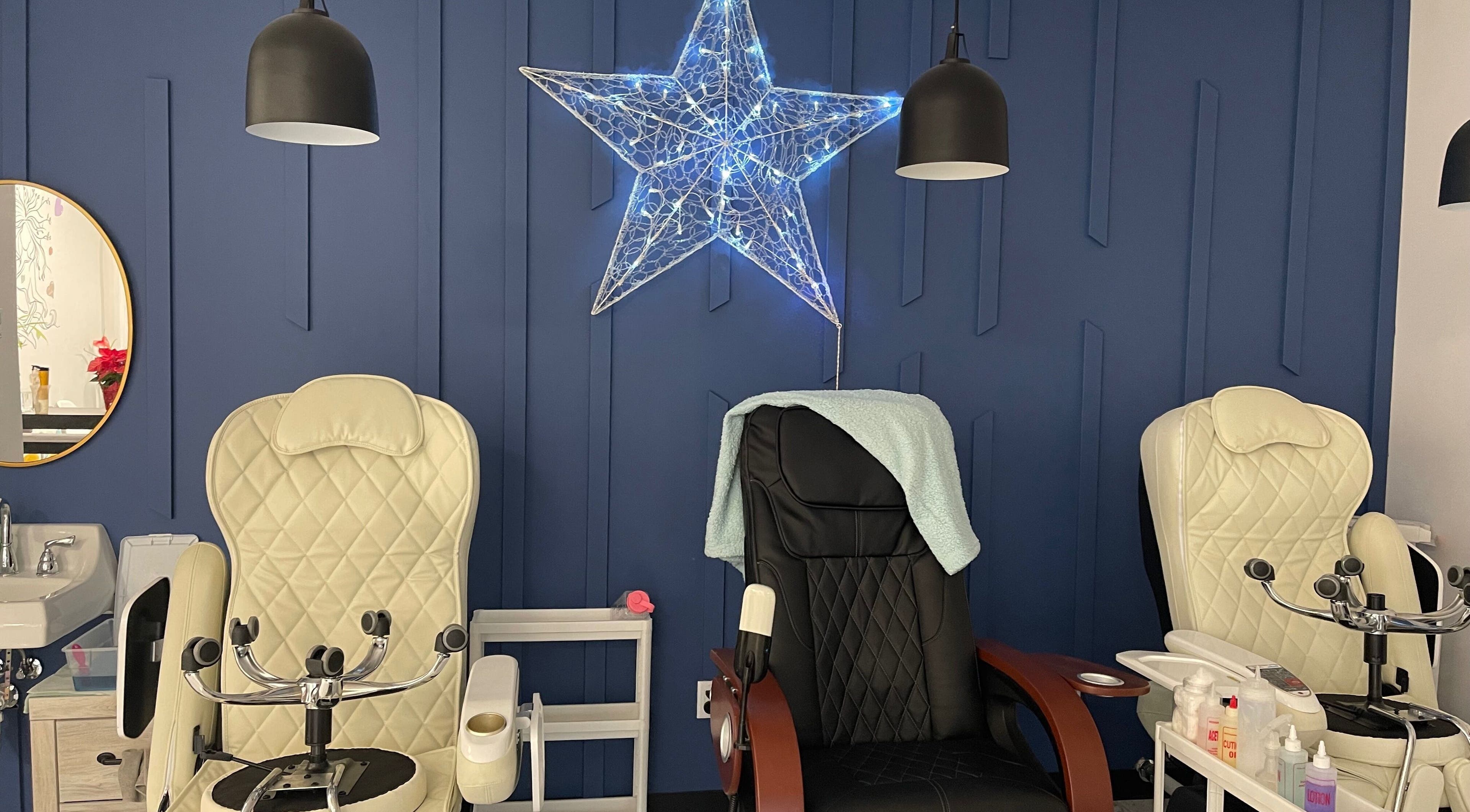 Elegant pedicure chairs with a star decoration at Monserrat Nails, Kenosha, Wisconsin, US.