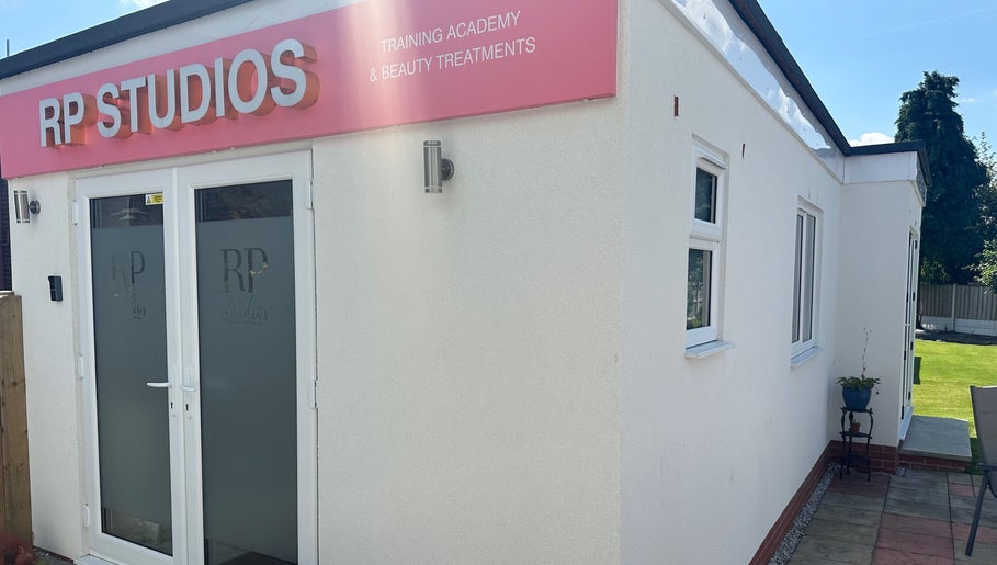 Front view of RP Studios, beauty training academy in Milnrow, England, GB, showcasing modern design.