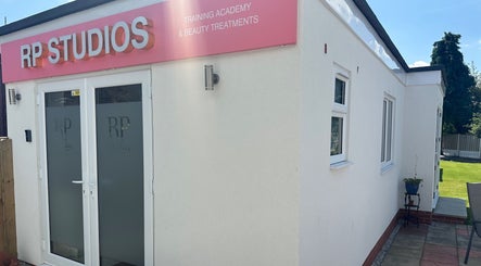 Front view of RP Studios, beauty training academy in Milnrow, England, GB, showcasing modern design.