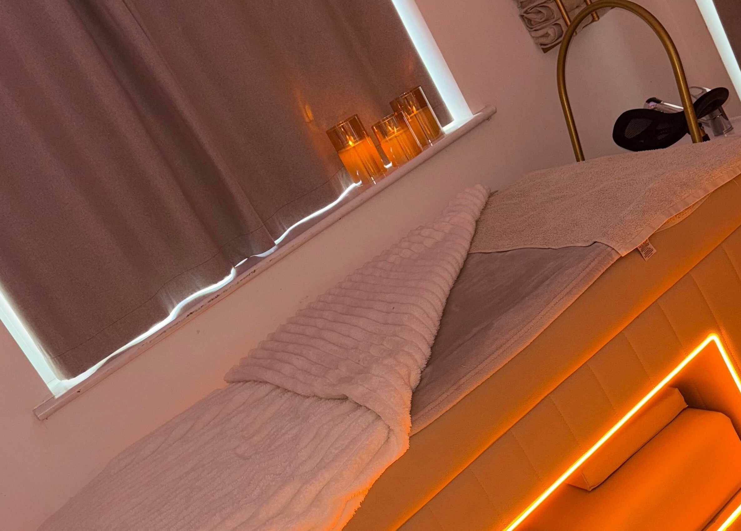 Relaxation bed with warm lighting in RP Studios, Milnrow, England, GB. Perfect for wellness and comfort.