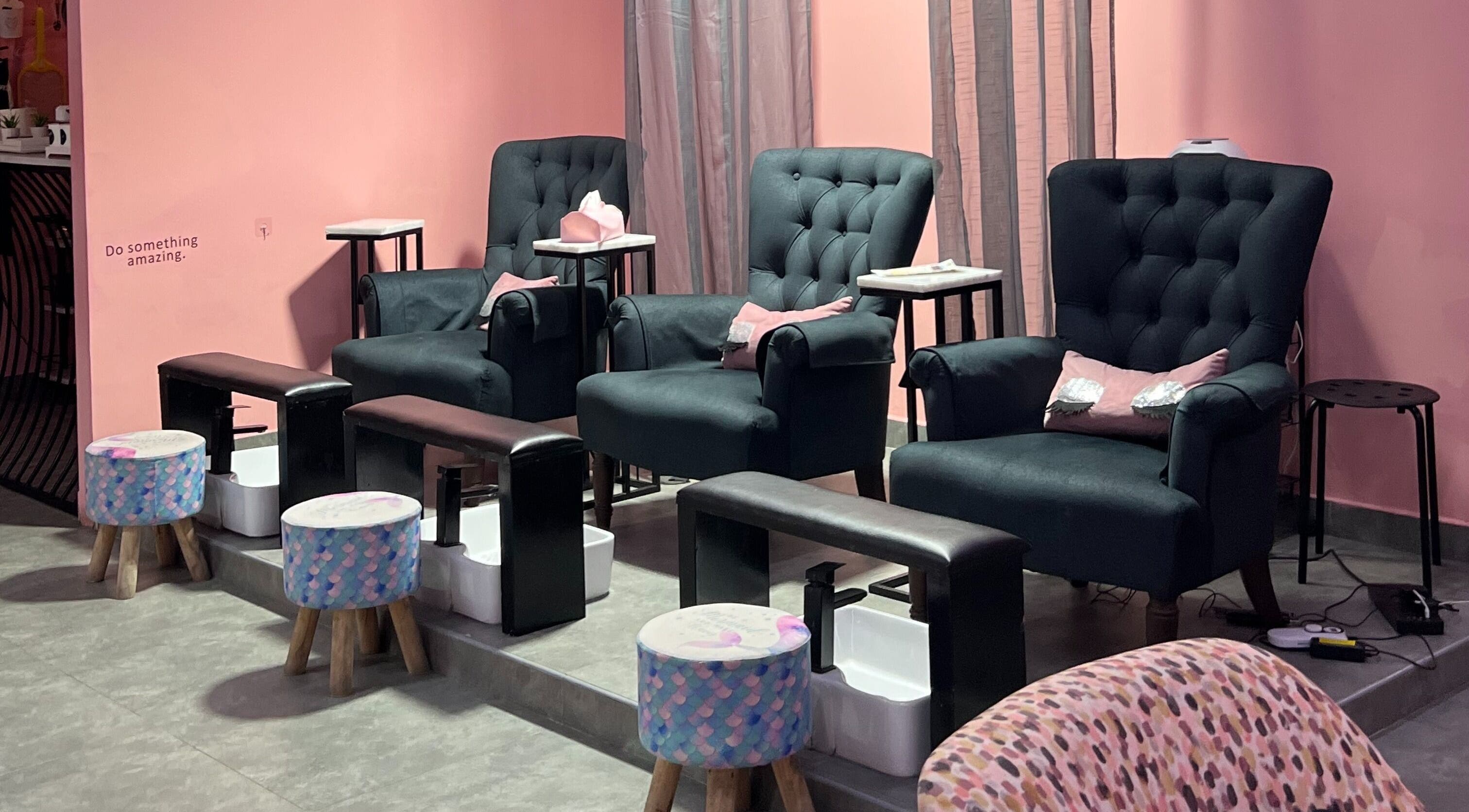 Pedicure lounge with plush chairs at Al Muzun Beauty Center, Sharjah, AE for a relaxing experience.
