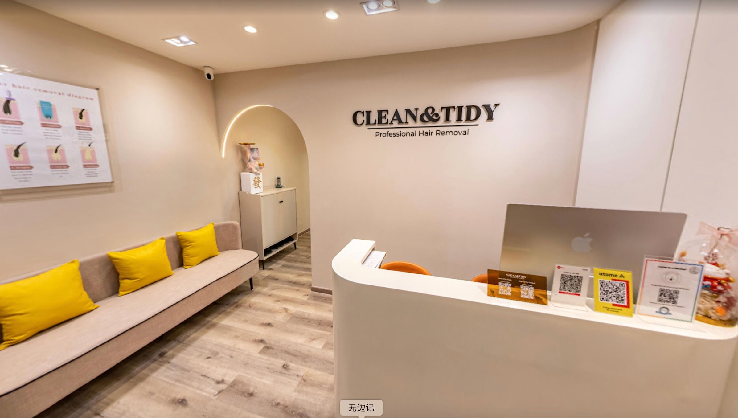Reception area at Clean and Tidy Orchard in Singapore featuring modern decor and cozy seating.
