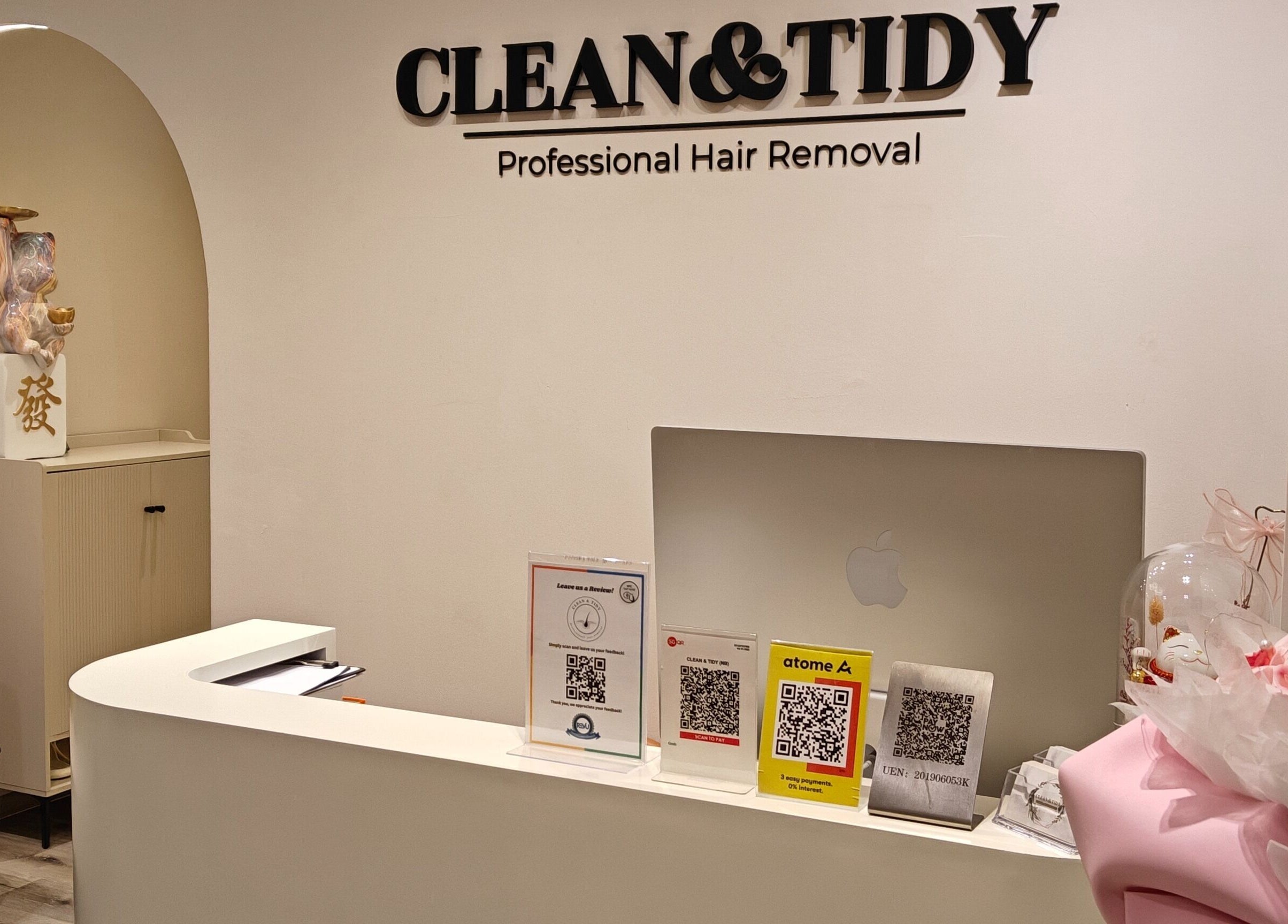 Reception at Clean and Tidy Orchard, Singapore, SG with floral decor and QR codes.