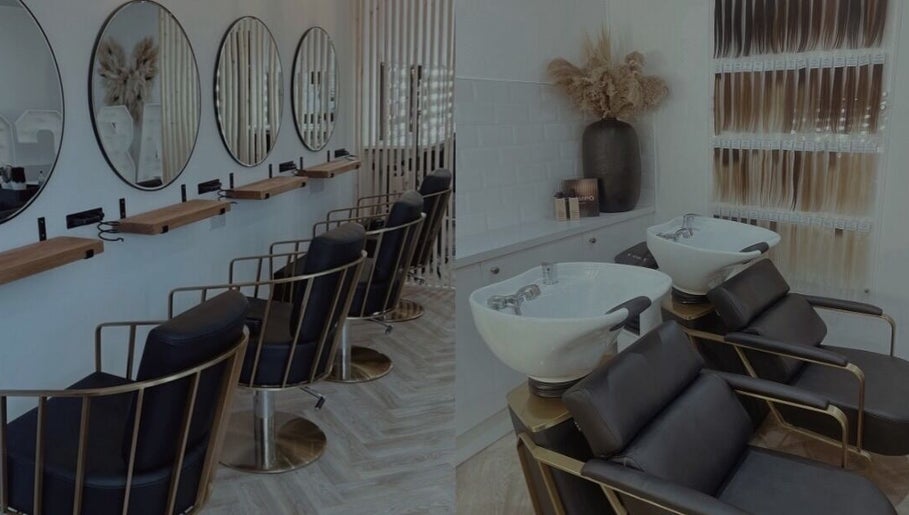 Elegant salon interior at Artist & Co. (Beth Hall Makeup Artist) in Rugby, England, GB, featuring stylish chairs.