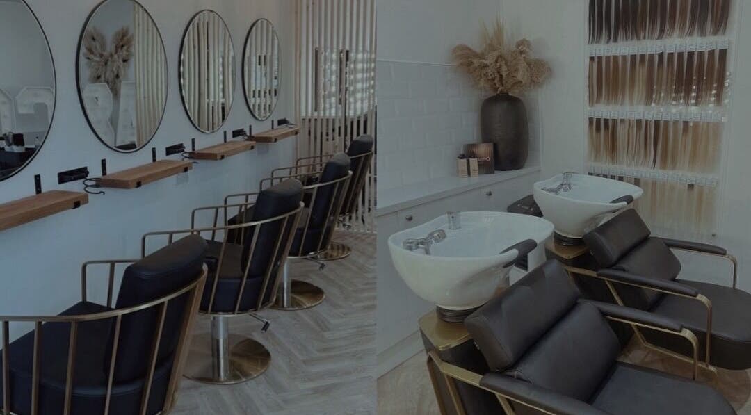 Elegant salon interior at Artist & Co. (Beth Hall Makeup Artist) in Rugby, England, GB, featuring stylish chairs.