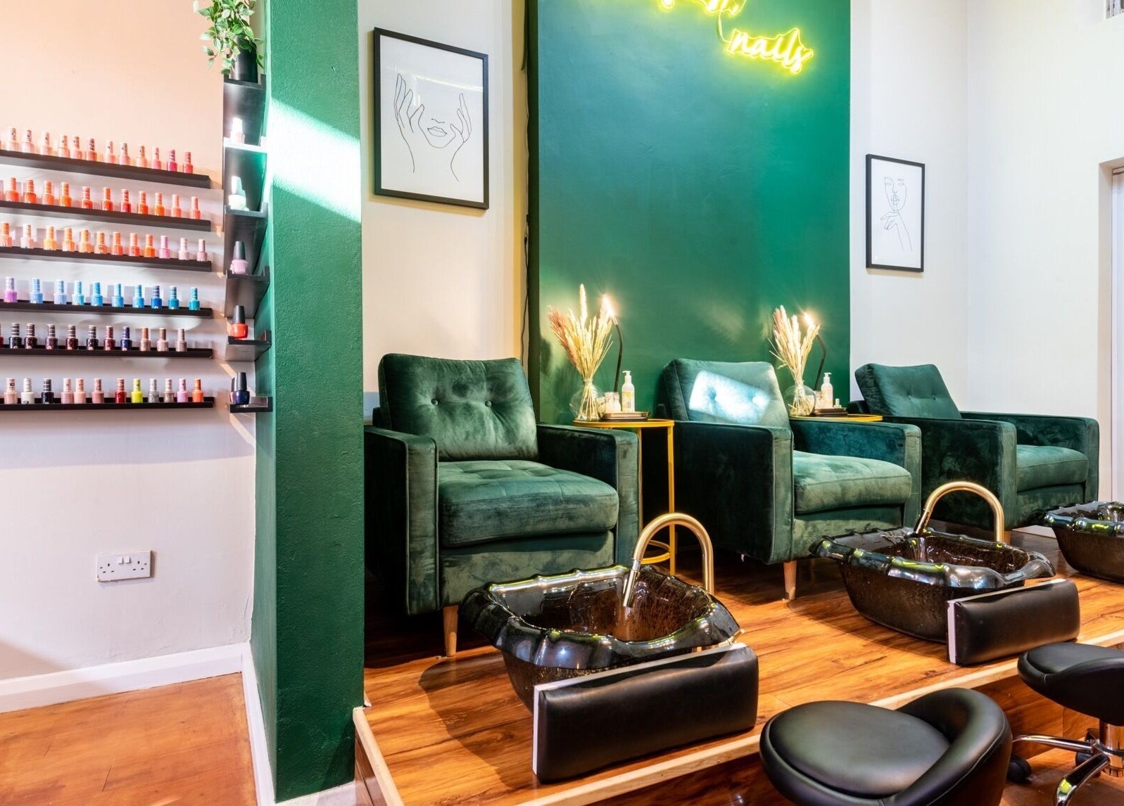 Elegant seating and polished decor at Kem Nail Bar, London, England, GB, showcasing nail polish collection.