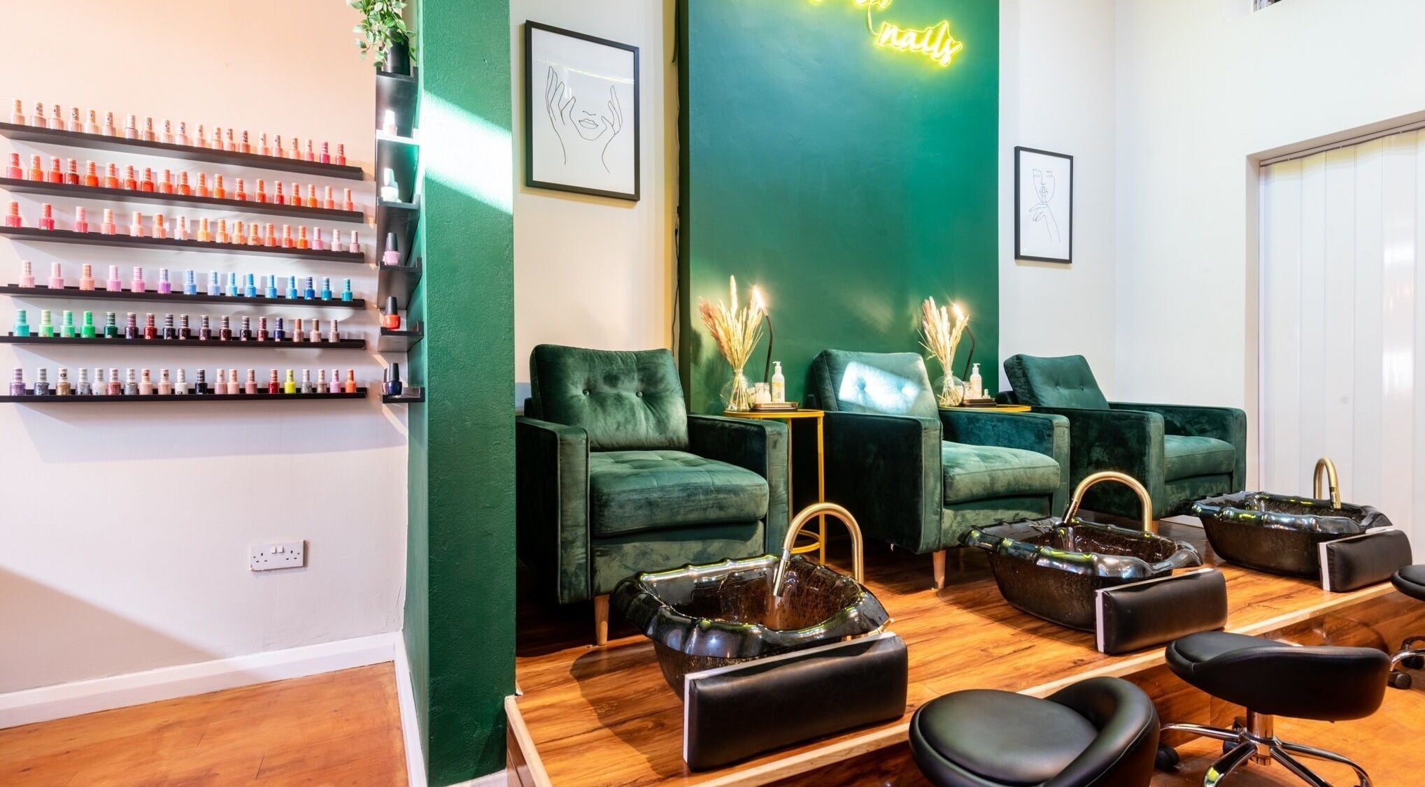 Elegant seating and polished decor at Kem Nail Bar, London, England, GB, showcasing nail polish collection.