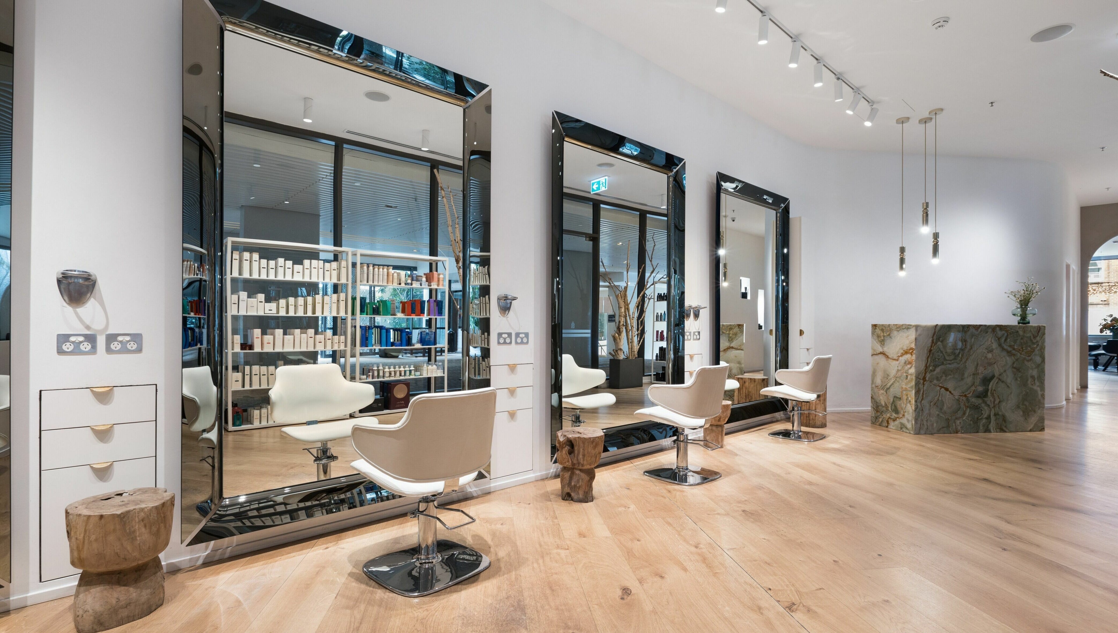 Modern salon interior at Koda Cutters - Bondi, Bondi Beach, New South Wales, AU, with stylish mirrors and seating.