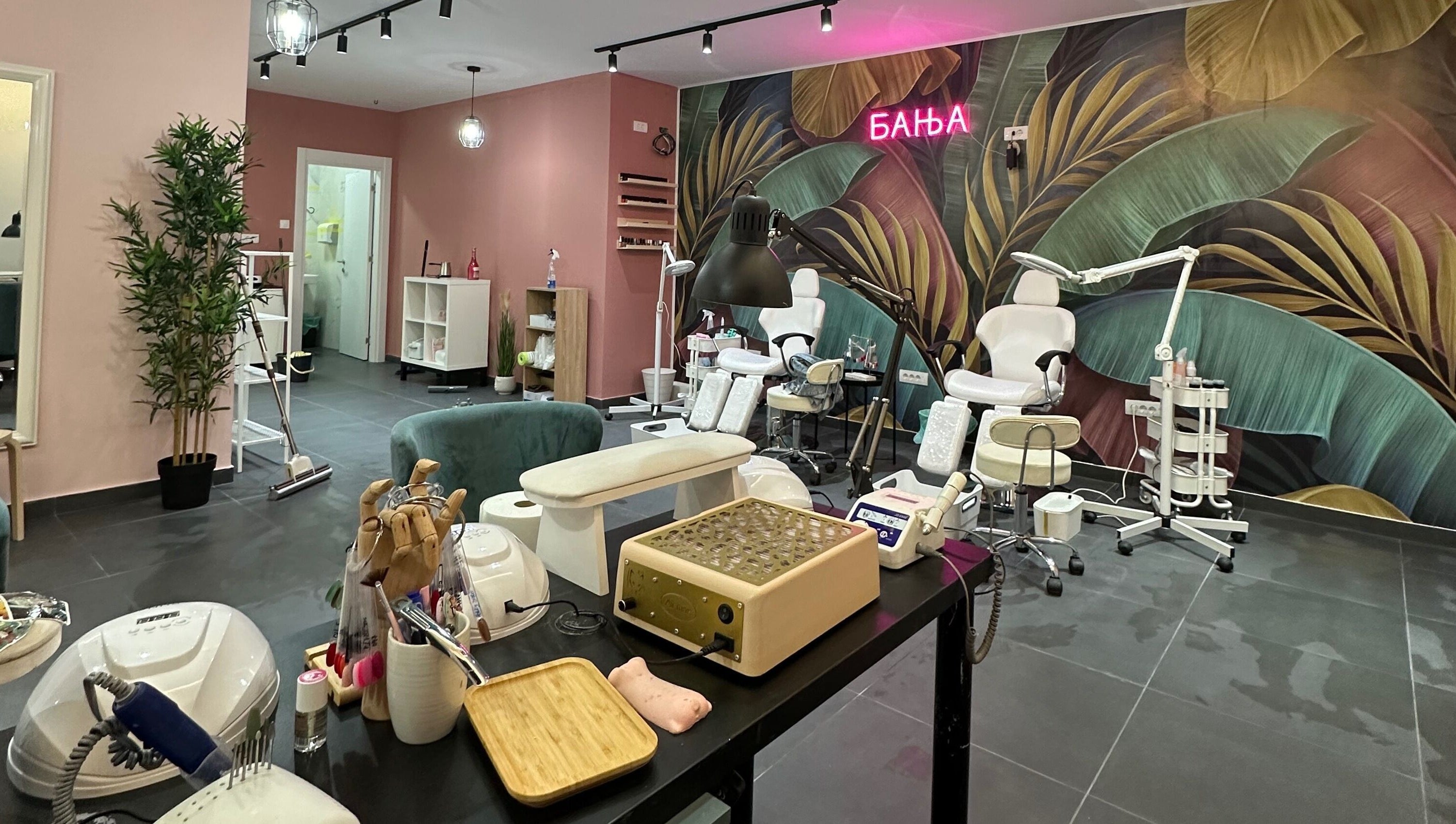 A modern beauty salon interior at Studio Banja, Београд, RS, featuring stylish decor and equipment.