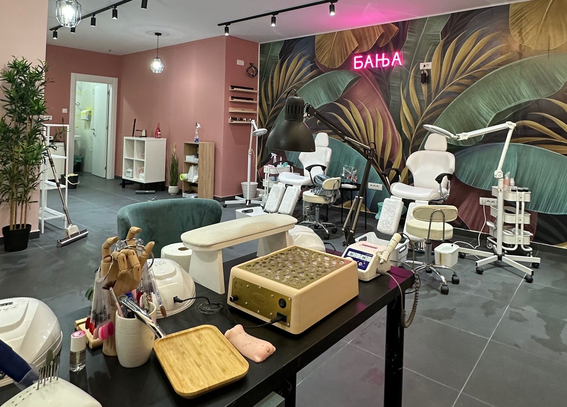 A modern beauty salon interior at Studio Banja, Београд, RS, featuring stylish decor and equipment.