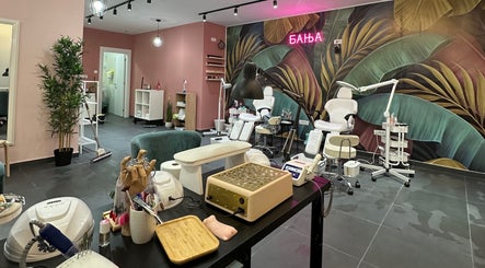 A modern beauty salon interior at Studio Banja, Београд, RS, featuring stylish decor and equipment.