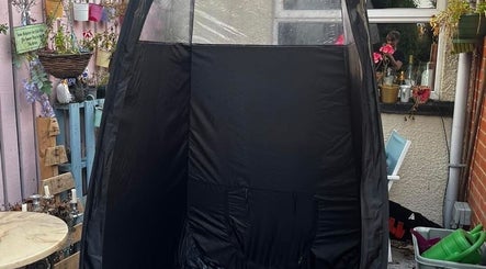 Outdoor tanning booth at The Tanning Room, Hall Green, England. Ideal for personal tanning sessions.