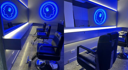 Modern salon chairs in blue-lit interior at Hearts & Minds Tuggerah (World Gym), Tuggerah, New South Wales, AU.