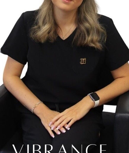 Friendly staff member at Hair & Beauty By Sophie, Saint Lawrence, England, GB, ready to assist clients.