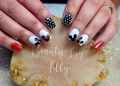 Stylish nail art featuring polka dots at Beauty By Tilly, Bradford, England, GB.
