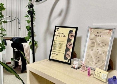 Hertime Lashes reception with price list and decor in Maylands, Western Australia, AU, showcasing welcoming ambiance.