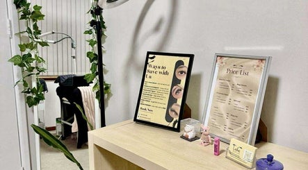 Hertime Lashes reception with price list and decor in Maylands, Western Australia, AU, showcasing welcoming ambiance.