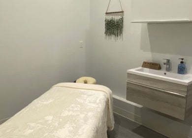 Serene massage room at Artayja’s Therapeutic Massage, Huntington Beach, California, US.