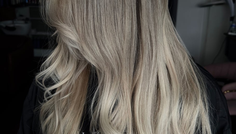 Blonde hair styling at Studio 58 at Deluxe, Maidstone, England, GB, showcasing elegant waves.