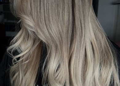 Blonde hair styling at Studio 58 at Deluxe, Maidstone, England, GB, showcasing elegant waves.