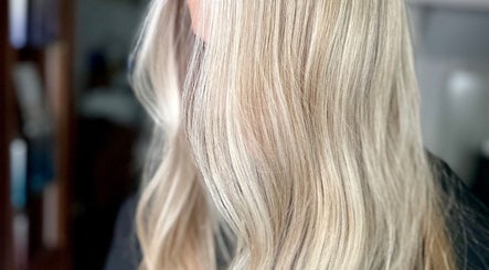 Blonde hair styled in waves at Studio 58 at Deluxe, Maidstone, England, GB.