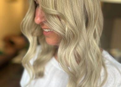 Close-up of wavy blonde hair at Studio 58 at Deluxe, Maidstone, England, GB.