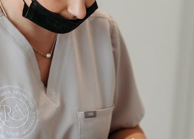 Professional at Rachel Abbie Aesthetics in London in a uniform, representing top-tier beauty services.