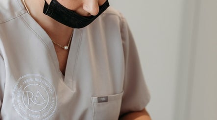 Professional at Rachel Abbie Aesthetics in London in a uniform, representing top-tier beauty services.