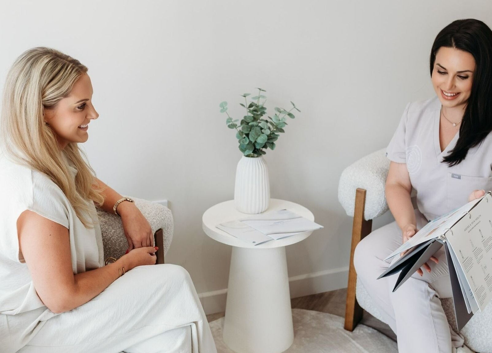 Client consultation at Rachel Abbie (RA) Aesthetics HQ in Lelant, England, GB, highlighting service excellence.