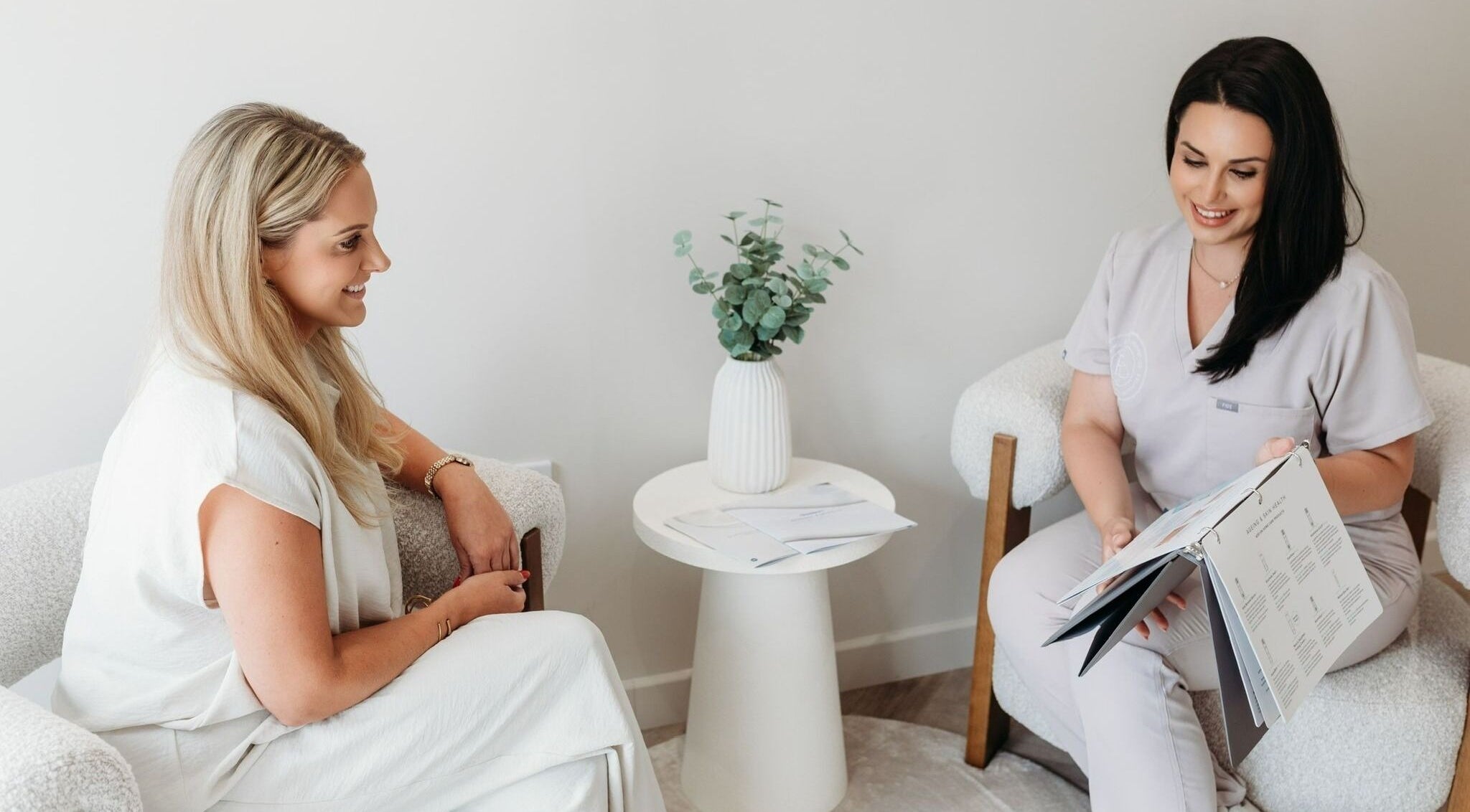 Client consultation at Rachel Abbie (RA) Aesthetics HQ in Lelant, England, GB, highlighting service excellence.