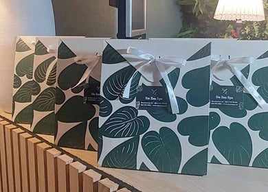 Beautiful gift bags lined up at Six Zen Spa, Breda, Noord-Brabant, NL, showcasing elegant design.