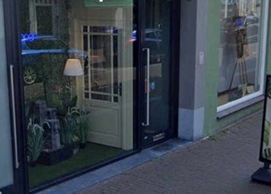 Front entrance of Six Zen Spa in Breda, Noord-Brabant, NL, showcasing a calming ambiance.
